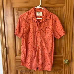 A multi design orange dress shirt button down
